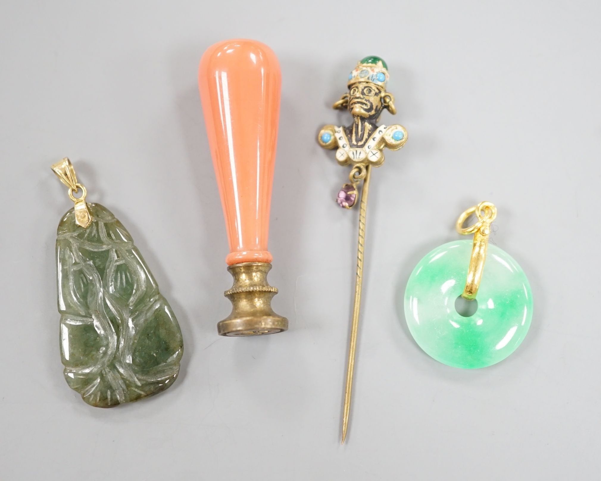 An 18k mounted jade set teardrop shaped pendant, 36mm and three other items of jewellery, including a seal and stick pin.